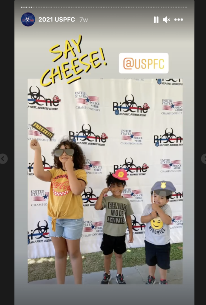 Family enjoying props at the Bio-One booth at the U.S. Police and Fire Championships Family enjoying props at the Bio-One booth at the U.S. Police and Fire Championships