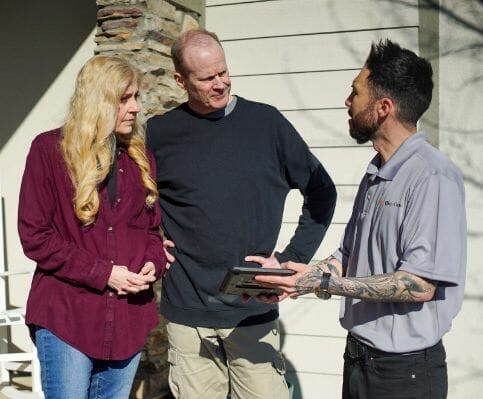 Bio-one Representative Talking to Couple